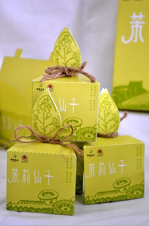 闽榕茶业“茉莉仙子”品牌包装设计——平面与纸材的雅致对话
